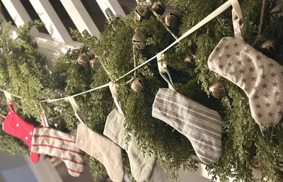Mini Christmas Stocking Garland - Ian Mankin, Sophie Allport, Clarke & Clarke - Image 1 of 3