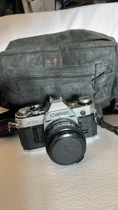 Canon AE-1 35mm SLR Film Camera w/ FD 50mm Lens & Canon Strap / Pentax Bag - Picture 1 of 7