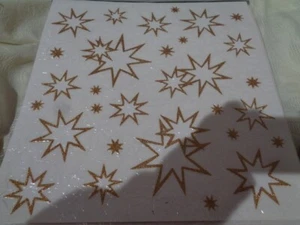 Fensterbild  ca. 31 x 31 cm     große und kleine goldene Sterne Neu OVP - Bild 1 von 1