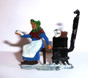 Vintage Heinrichsen German Flat Lead Woman At Stove with Teacup Very Near Mint - Picture 1 of 4