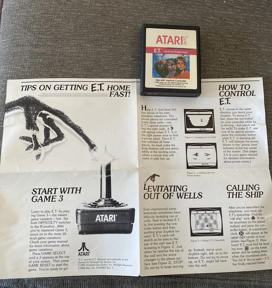 Atari 2600 E.T. GAME KART W/INSTRUCTIONS . PLAYS FINE 1982 Rare - Image 1 of 1
