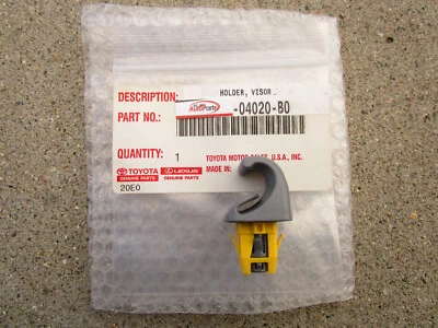 SE ADAPTA A: 06 - 15 TOYOTA TACOMA SOPORTE PARA PARASOL CLIP CANTIDAD 1 OEM NUEVO GRIS Foto 1 de 4