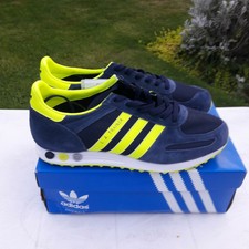 yellow adidas trainers