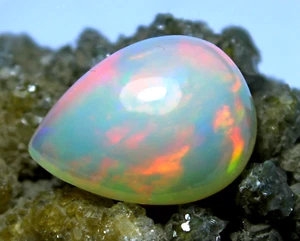 Impresionante piedra natural etíope ópalo de fuego cabujón forma pera 5,95 quilates - Imagen 1 de 7