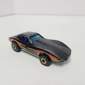 Hot Wheels Chevrolet Corvette Stingray 1975 Base Black Orange Red Yellow Stripe - Picture 1 of 11