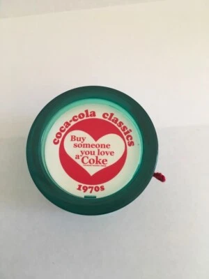 YoYo Coca-Cola Clásico "Compra a alguien que ames una Coca-Cola" Años 70 Nuevo de Lote Antiguo YoYo Foto 1 de 4