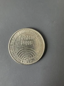$1 SLOT TOKEN COIN RAINBOWHOTEL CASINO LAS VEGAS NEVADA RARE - Picture 1 of 2