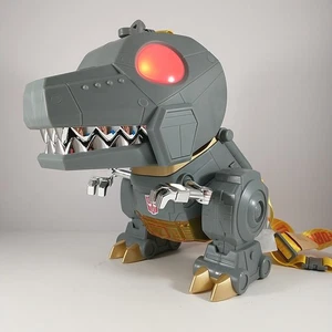 Universal Studios Transformers Grimlock Dinobot LightUp Popcorn Eimer - Bild 1 von 9