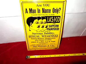 LAS-I-CO TABLETS FOR SUPERB MANHOOD ADV. SIGN EMBOSSED TIN METAL TACKER - Z 470 - Picture 1 of 5