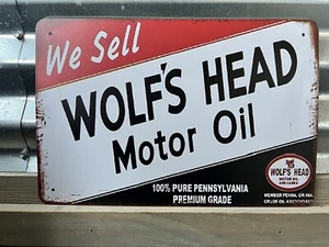 WE SELL WOLFS HEAD MOTOR OIL TIN SIGN 8"X12" DISTRESSED LOOK - Picture 1 of 1