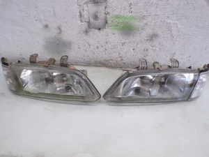 2x Scheinwerfer Nissan Primera P11 Frontscheinwerfer + Blinker *F85502* - Bild 1 von 11