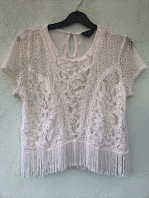 TOP MUJER GORRA MANGA Y RECORTADO TALLA 14 DE TOPSHOP BLANCO/CREMA CON BORLAS Foto 1 de 4