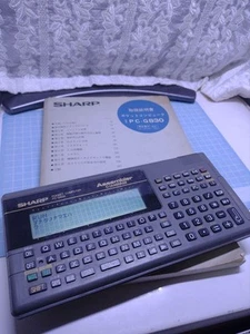 SHARP PC-G830 Taschencomputer mit Handbuch getestet Retro Elektronik - Bild 1 von 12