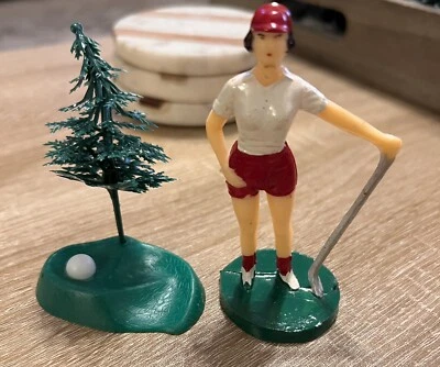 Topper de pastel vintage para dama golfista con verde y pelota  Foto 1 de 3