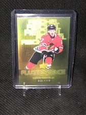 2022-23 Upper Deck Series 2: Lukas Reichel #F-3 FLUORESCENCE GOLD #’d 009/150