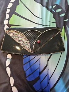 BLACK PATENT IRREGULAR CHOICE CLUTCH BAG LARGE - Picture 1 of 5