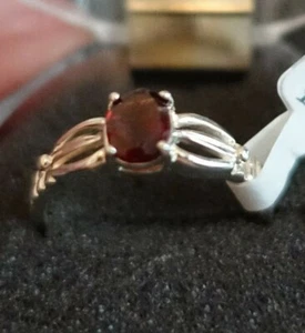 Size 8 Rhodium over SS Band With . 5 Carat Garnet CZ & Embellished Design Sides - Picture 1 of 4