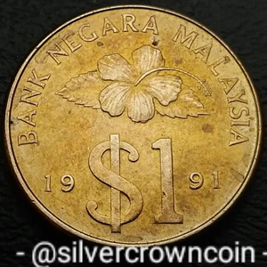Malaysia 🇲🇾 1 Ringgit 1991. KM#54. One Dollar coin. Flower. Malaya. Dagger.  - Picture 1 of 7