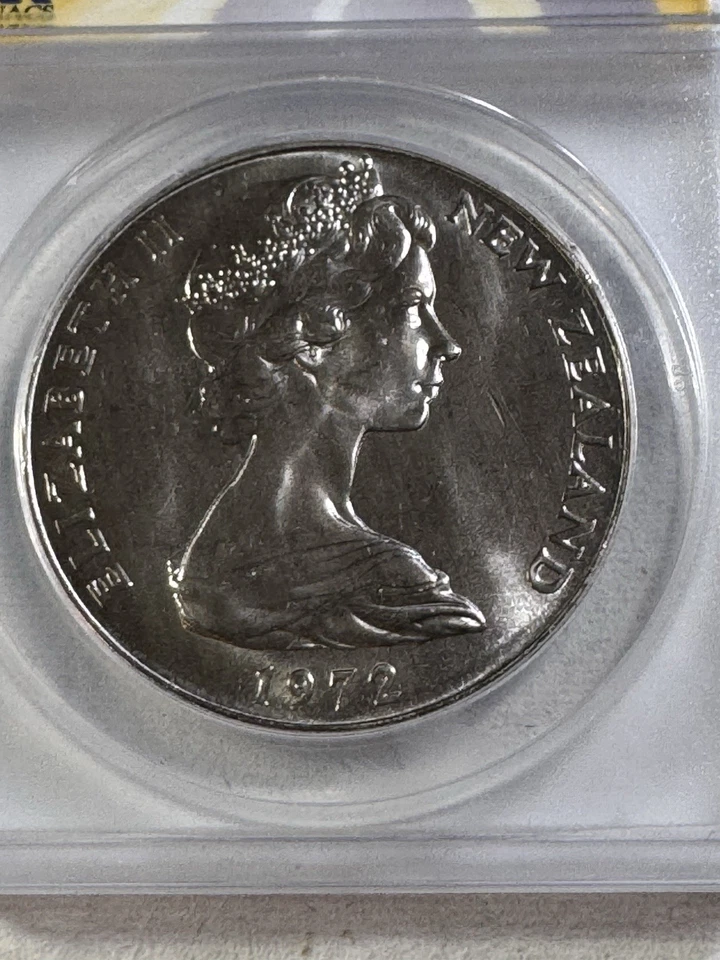 Nueva Zelanda 1972 1 dólar calificado como nuevo 68 por ANACS Foto 1 de 4