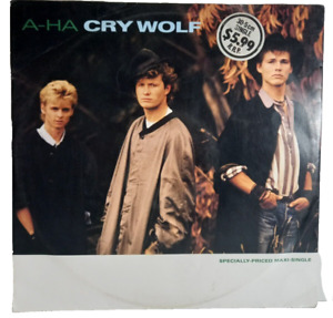 AHA - 1986 US MAXI SINGLE 12" CRY WOLF. 
