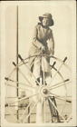 Happy Woman Smiling Silly at Ship Healm Wheel c1910 Real Photo Postcard