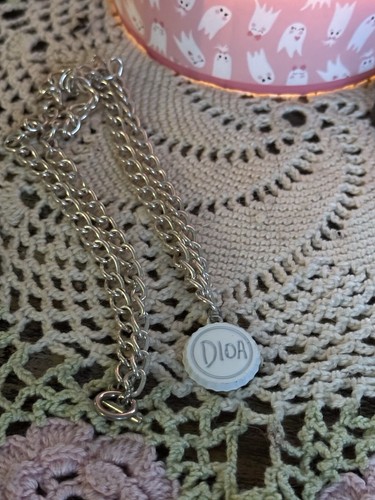 Collana moda Dior con cerniera e tappo bottiglia