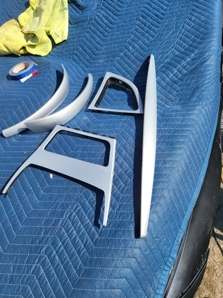 Juego de paneles de moldura de aluminio interior consola de puerta BMW OEM E88 E82 135i 128i Foto 1 de 4