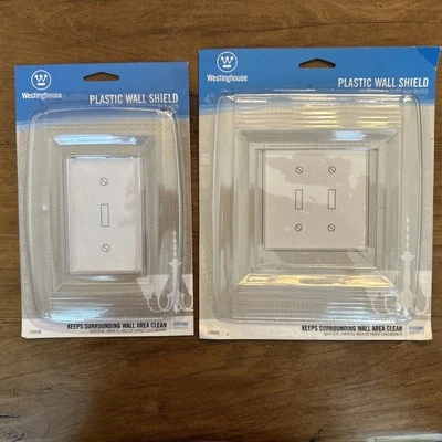 2 placas de salida de interruptor protector de pared de plástico transparente Westinghouse 74998 y 74999 Foto 1 de 4