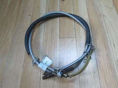 NOS 1984 FORD TEMPO REAR PARKING BRAKE CABLE 60" E43Z-2A635-A - Image 1 of 2