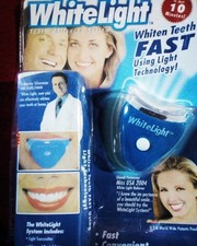 Teeth Whitening Whitens Fast as seen on U.S TV Commercial Whitelight