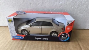 WELLY NEX DROMADER TOYOTA COROLLA BEIGE 1/34 1:34 MODEL DIECAST METAL - Picture 1 of 2