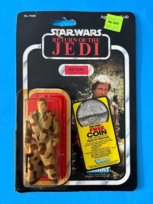 TRINCHERA KENNER HAN SOLO STAR WARS 1983 77 CORREO TRASERO MONEDA OFERTA PEGATINA Foto 1 de 4