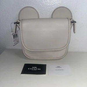 Neu mit Etikett Disney X Coach F59369 Patricia Sattelhandschuh Kalbsleder mit Mickey-Ohren - Bild 1 von 8