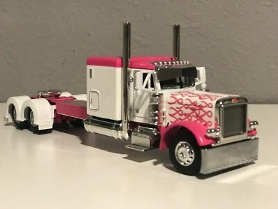 NEW 1/64 DCP PINK PETERBILT 379 60" BUNK 320" FRAME (6 12" long) VERY RARE - Image 1 of 2