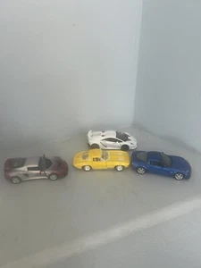 Kinsmart luxury toy car set 1/32 scale set of 4 Lamborghini, Lotus, Corvette Ray - Picture 1 of 5