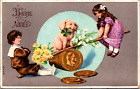 Pig lucky clover kids seesaw lucky gold coins cute piglet French New Year c1909
