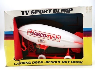 De colección TV Deportes Dirigible Juguete Ojo en el Cielo EE. UU. Procesado Plástico Co Raro Completo con Caja Foto 1 de 4