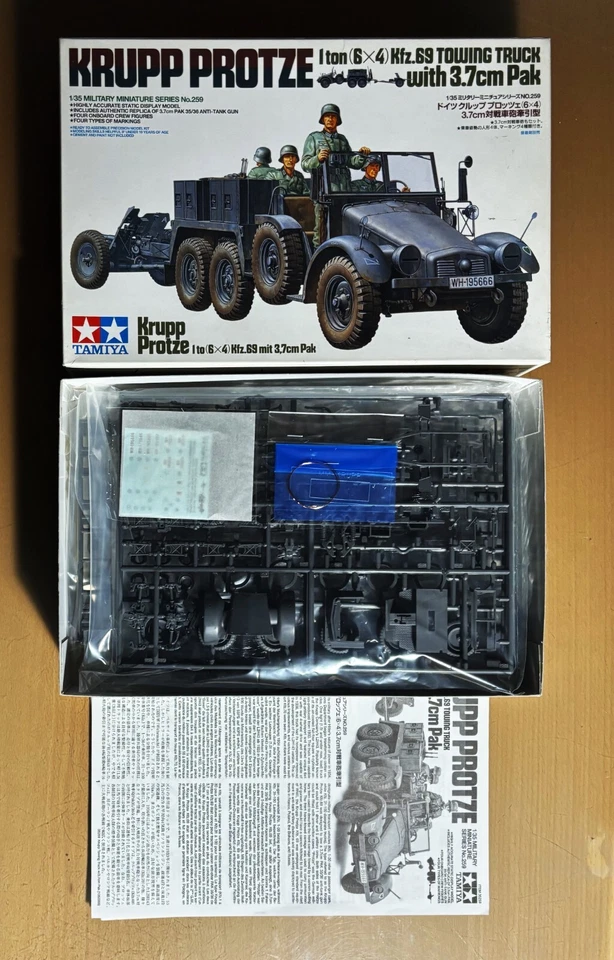 TAMIYA 35259 - KRUPP PROTZE 1 ton (6x4) Kfz.69 TOWING TRUCK w/3.7cm PAK - 1/35 - Immagine 1 di 1