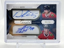 DUNCAN KEITH / JONATHAN TOEWS 2017-18 The Cup Dual Scripted Swatches 6/15 HAWKS