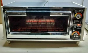 Tostadora General Electric Deluxe-R-Oven Modelo A2T131B Parrilla para Hornear de Acero Inoxidable - Imagen 1 de 6
