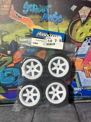 Team Associated Hoonicorn Wheels & Tires (rubber) - Image 1 of 4