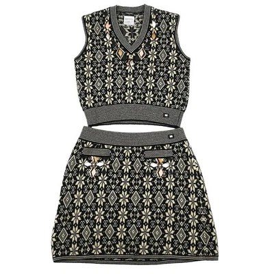 Chanel Settup Traje Top Falda Negro 01A #38 134904 Foto 1 de 4