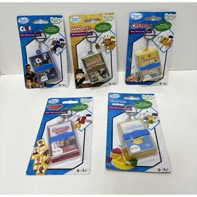 Hasbro Mini Keychain Games Clue Monopoly Guess Who Operation Trivial Pursuit Lot - Image 1 of 4
