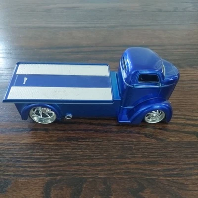Camión diecast Jada 1947 Ford COE plataforma deslizante transporte de auto plano azul 1:24 Foto 1 de 4