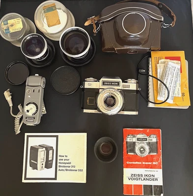 Lote De Colección Carl Zeiss Ikon Contaflex con Cámara y Estuche, Lente, Gorila y Estuche de Transporte Foto 1 de 4