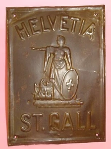 Insegna 'HELVETIA SAN GALLO' ASSICURAZIONE SULLA VITA LATTA METALLO GOFFRATO anni '40 - Foto 1 di 6