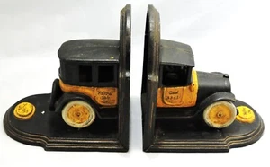 VINTAGE YELLOW CAB BOOKENDS CAST IRON - Picture 1 of 4