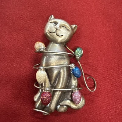 Pewter Cat Wrapped in Christmas String Light Bulbs Glitter Enamel Pin Brooch - Image 1 of 4