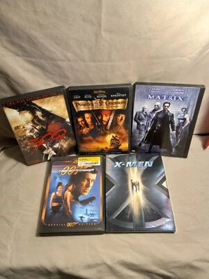 PACK OF 5 DVD MOVIES,XMEN,MATRIX,PIRATES OF CARIBBEAN CURSE,300,JAMES BOND WORLD - Image 1 of 4