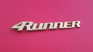 96 97 98 99 00 01 02 TOYOTA 4RUNNER REAR GOLD EMBLEM LOGO BADGE USED OEM C31 - Bild 1 von 3